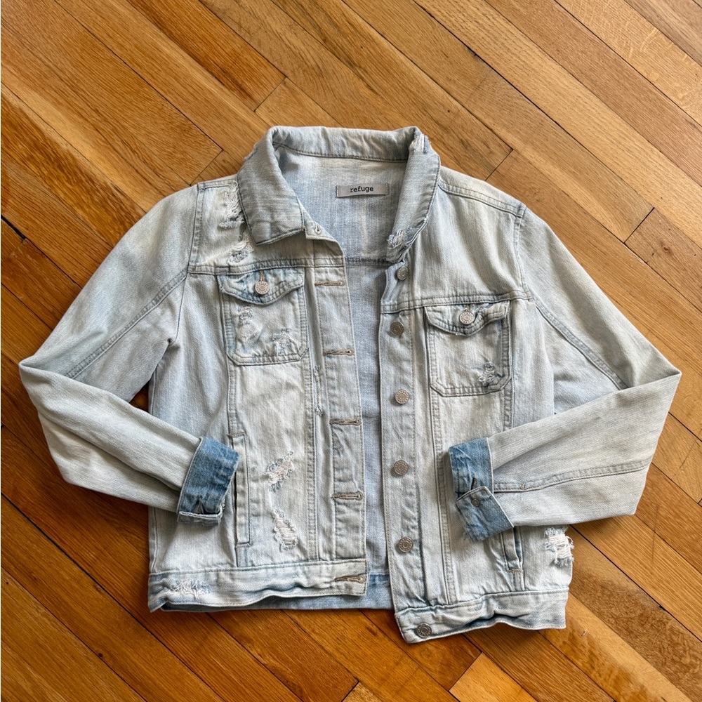 Light wash distressed denim jacket